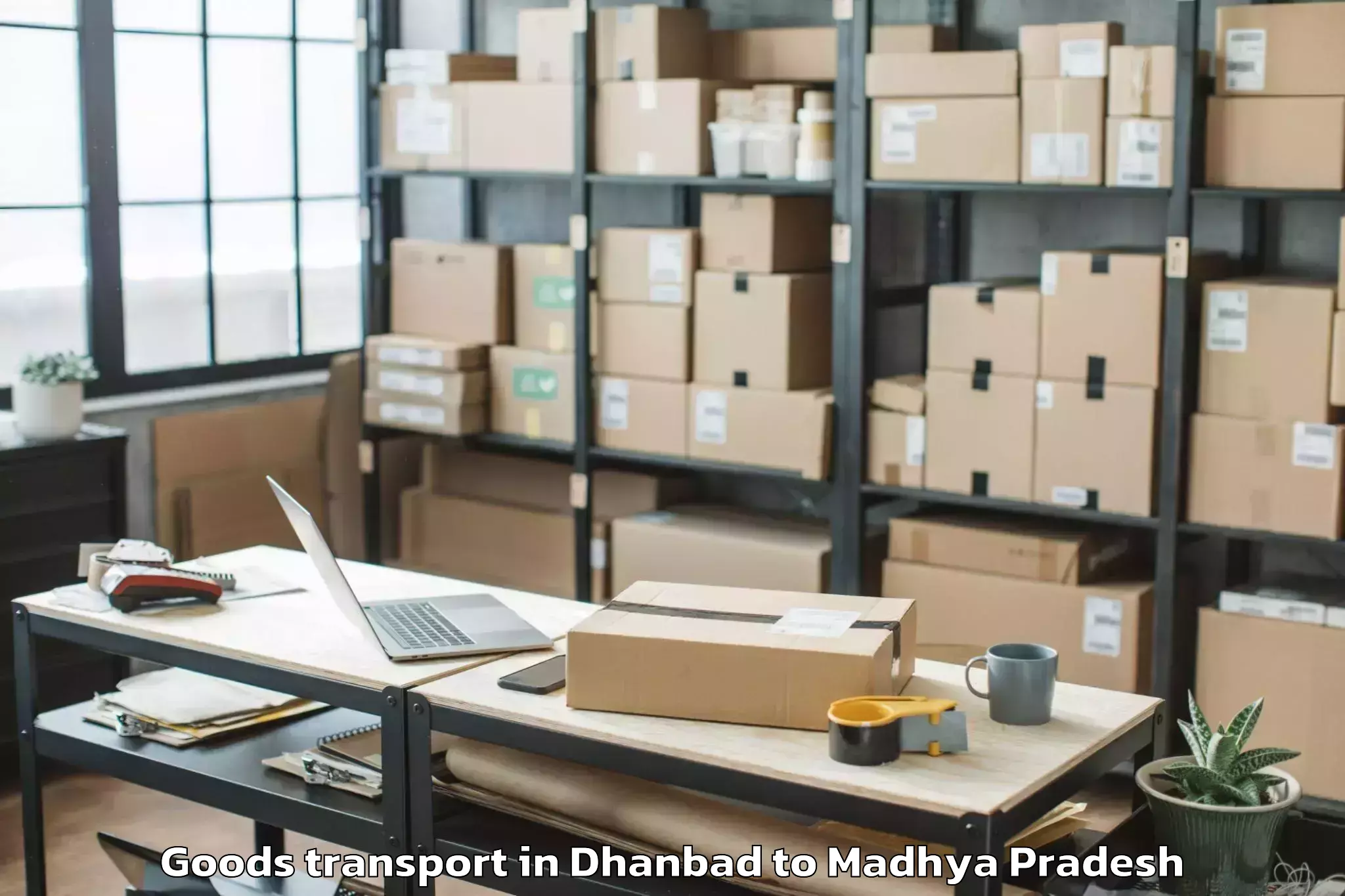 Efficient Dhanbad to Khajuraho Airport Hjr Goods Transport